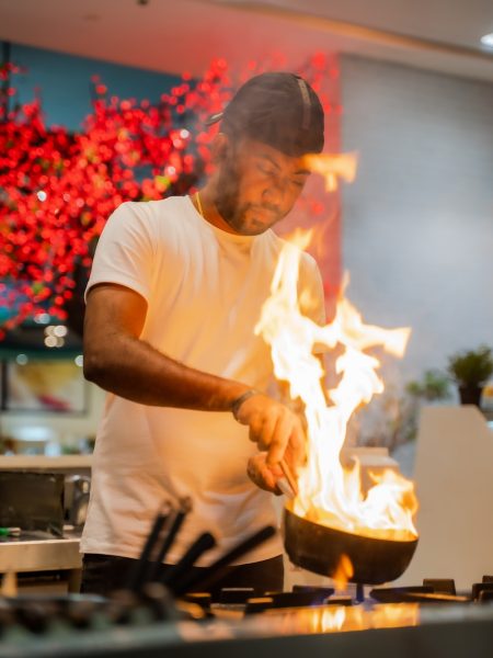 Image of a chef flambeing